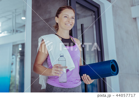 Jolly mature woman engaging in active sport 44057717