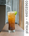 ice lemon tea on wood table ,selective focus 44058960
