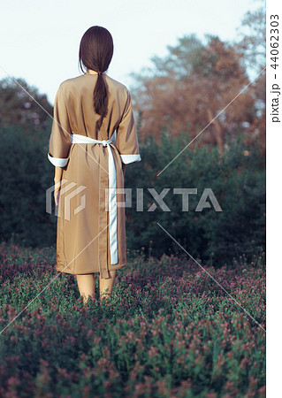 Asian woman in traditional japanese kimono outdoors 44062303