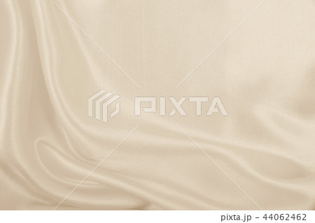 Smooth elegant golden silk or satin luxury cloth Smooth elegant golden silk or satin luxury cloth 44062462