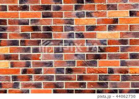 Background of old weathered red brick wall 44062730