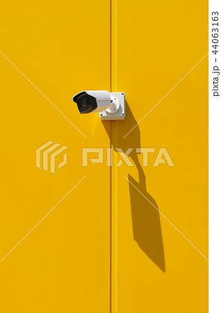 Security camera at a wall 44063163