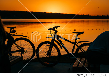 bicycle on the background of a sunset bicycle on the background of a sunset 44063254