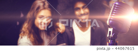 Composite image of close-up of microphone Composite image of close-up of microphone 44067615