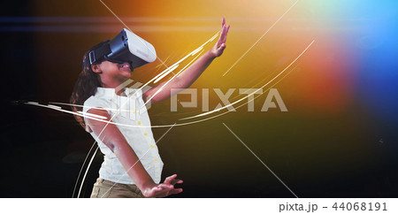 Girl gesturing while wearing virtual reality simulator Girl gesturing while wearing virtual reality simulator 44068191