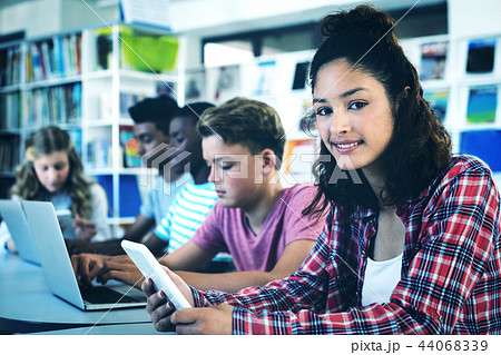 Students using laptop, digital tablet 44068339