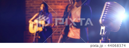 Composite image of close-up of microphone Composite image of close-up of microphone 44068374