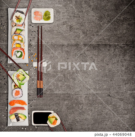 Traditional japanese sushi pieces on rustic concrete background. 44069048