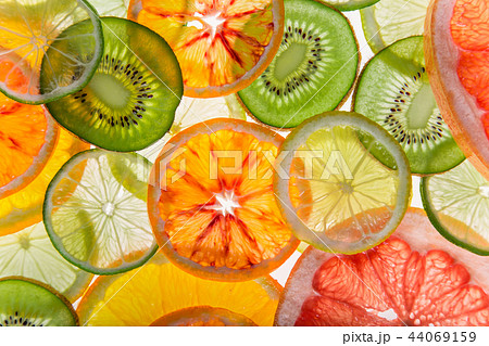 Bright fresh citrus slices, back light transparent fruit. 44069159
