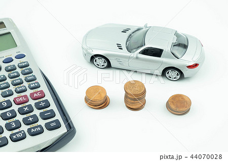 Miniature car model, coin and calculator 44070028