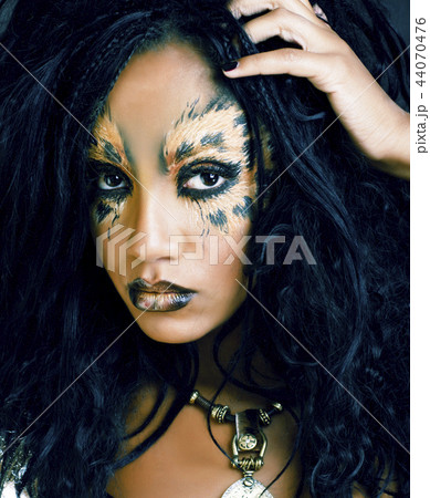 beauty afro girl with cat make up, creative leopard print closeu beauty afro girl with cat make up, creative leopard print closeu 44070476