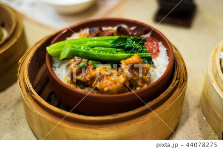 Chinese Cantonese dimsum meal in bamboo steamer Chinese Cantonese dimsum meal in bamboo steamer 44078275