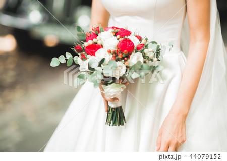 Portrait of a beautiful fashion bride, sweet and sensual. Wedding make up and hair Portrait of a beautiful fashion bride, sweet and sensual. Wedding make up and hair 44079152