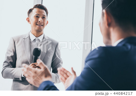 Businessman explain work to officer while training Businessman explain work to officer while training 44084217
