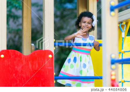 Black girl on the playground. 44084806