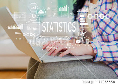 Statistics with woman using a laptop Statistics with woman using a laptop 44085550