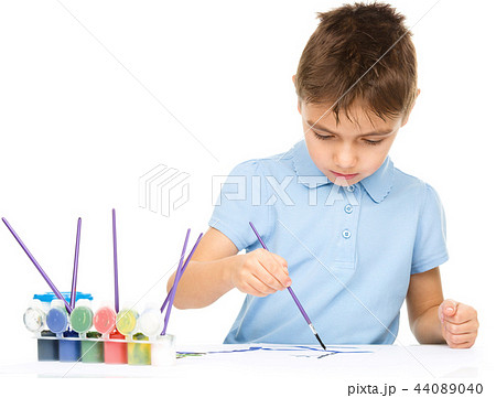 Boy is playing with paints 44089040