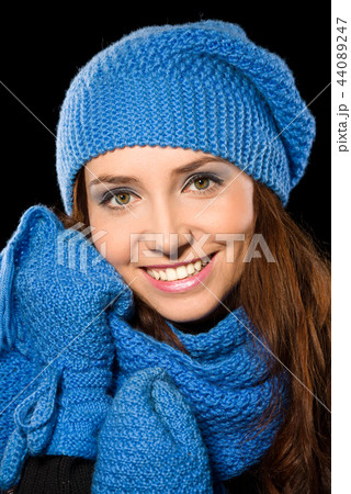 Young happy woman wearing winter cloth 44089247