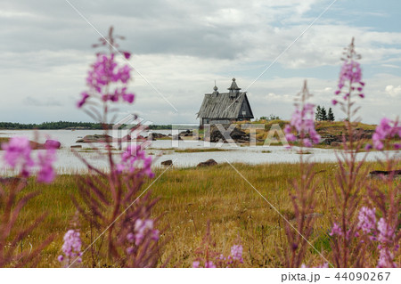 Old russian Orthodox wooden church in the village Rabocheostrovsk, Karelia. Abandoned church on the 44090267