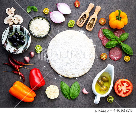 The ingredients for homemade pizza . 44093879