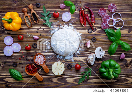 The ingredients for homemade pizza . 44093895