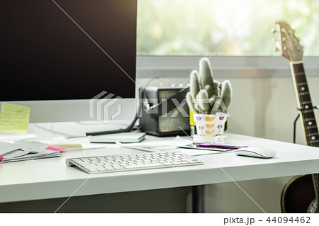 Computer desktop with keyboard and mouse on desk 44094462