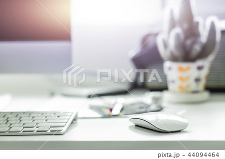 Computer desktop with keyboard and mouse on desk 44094464