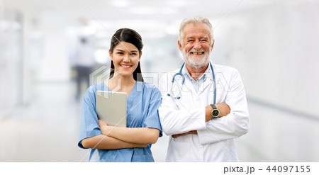 Senior and young doctor working in the hospital. 44097155