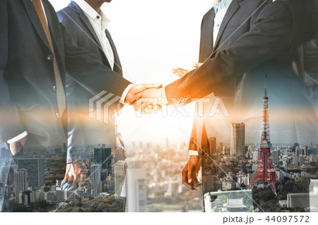 Double exposure Business People Handshake Meeting 44097572