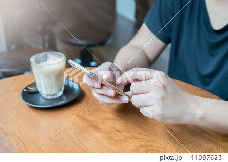 woman hand using smartphone for transaction 44097623