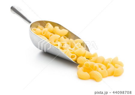 Uncooked elbow macaroni. 44098708
