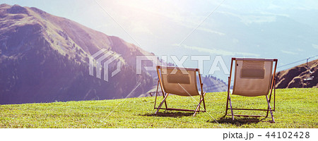 two chairs in the mountains 44102428