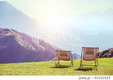 two chairs in the mountains 44102429