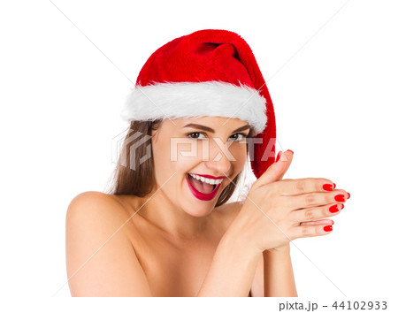 Pretty woman in santa hat, isolated Pretty woman in santa hat, isolated 44102933