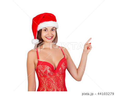 Pretty woman in christmas hat, isolated Pretty woman in christmas hat, isolated 44103279