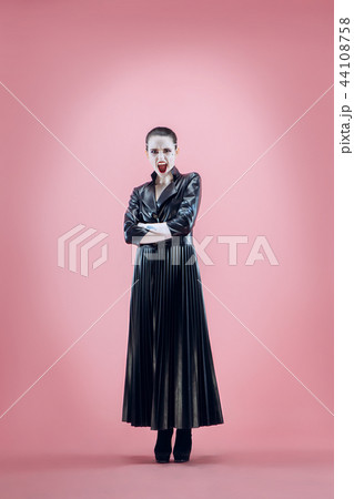 Halloween. Beautiful woman with bright black halloween makeup, black and white Halloween. Beautiful woman with bright black halloween makeup, black and white 44108758