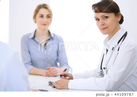 Doctor and patient at meeting. Medicine and health care concept Doctor and patient at meeting. Medicine and health care concept 44109787