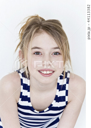 Cute girl with blond long hair on white 44113382