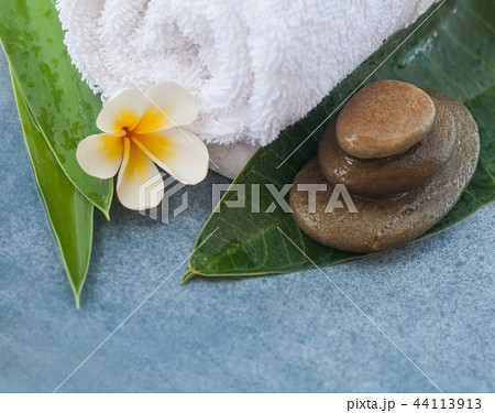 spa tropical set for massage on blue background 44113913