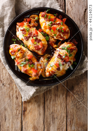 Chicken breast baked with monterey cheese 44114073