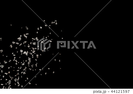 Split debris of stone exploding against black 44121597