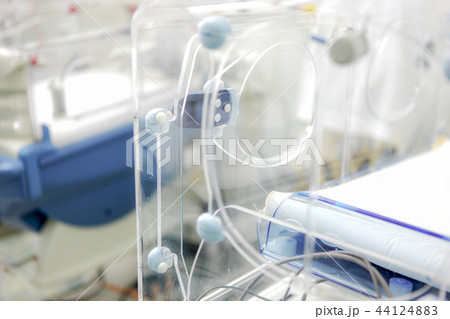 Newborn baby in hospital incubator Newborn baby in hospital incubator 44124883