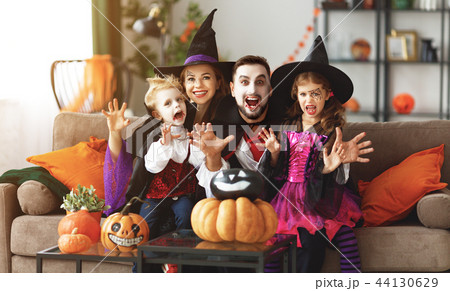 happy family mother father and children in costumes and makeup o 44130629