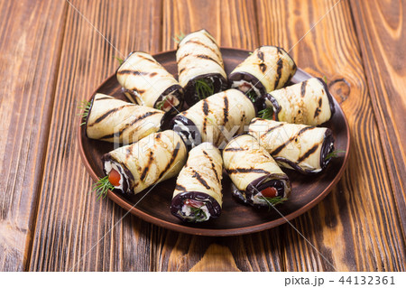 Grilled eggplant aubergine rolls with cream cheese 44132361