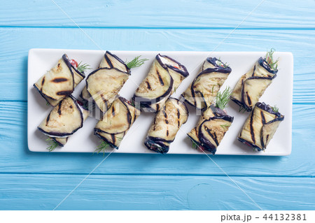 Grilled eggplant aubergine rolls with cream cheese 44132381