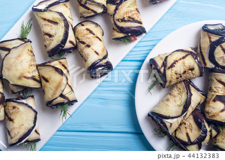 Grilled eggplant aubergine rolls with cream cheese Grilled eggplant aubergine rolls with cream cheese 44132383