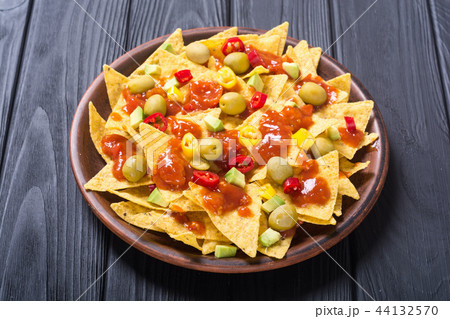 Nachos with sauce salsa Nachos with sauce salsa 44132570