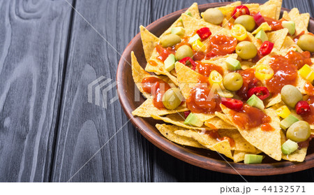 Nachos with sauce salsa Nachos with sauce salsa 44132571