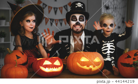 family father and children in costumes and makeup to halloween w family father and children in costumes and makeup to halloween w 44144219