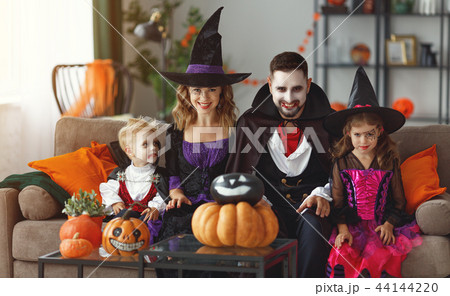 happy family mother father and children in costumes and makeup o happy family mother father and children in costumes and makeup o 44144220